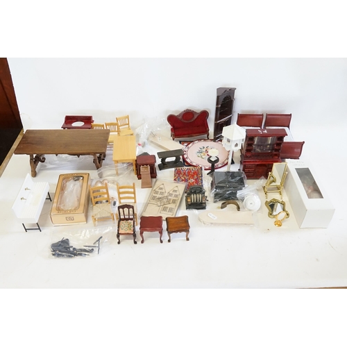 517 - A Collection of Dolls Furniture to include Beds, Corner Cupboards, Settee's, Table, Chairs, Cooker, ... 