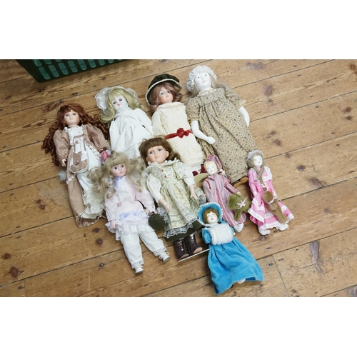 524 - A Collection of Nine Modern Collectible Dolls in Original Clothing & all in Excellent Condition.