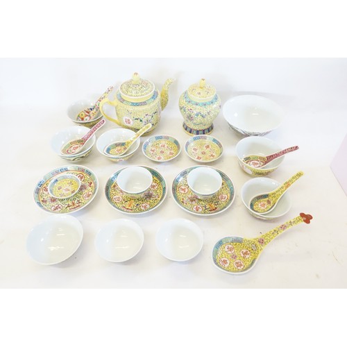 647 - A Chinese Cantonese enamelled Yellow Ground Tea Pot with Chinese Characters, Rice Bowls, Spoons, Gin... 