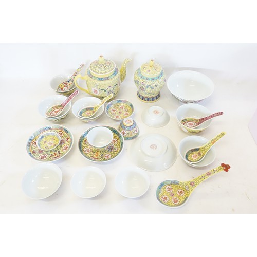 647 - A Chinese Cantonese enamelled Yellow Ground Tea Pot with Chinese Characters, Rice Bowls, Spoons, Gin... 