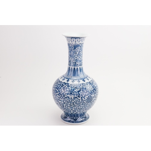 552 - A Chinese Blue & White Onion Shaped, Flared necked Vase decorated with Cabbage Leaves, Octopus Tenta... 