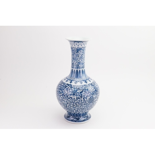 552 - A Chinese Blue & White Onion Shaped, Flared necked Vase decorated with Cabbage Leaves, Octopus Tenta... 