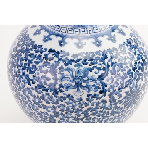 552 - A Chinese Blue & White Onion Shaped, Flared necked Vase decorated with Cabbage Leaves, Octopus Tenta... 