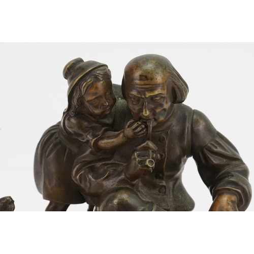 725 - A Bronze French Study of a seated Smoking Gentleman with Pipe with a Young Girl & a Dog looking on. ... 