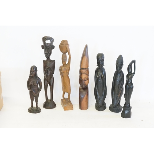 735 - A Collection of African Carved Wood Figures.