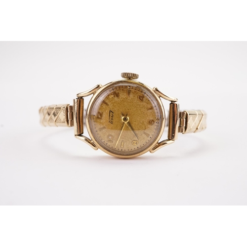 149 - A ladies 9ct gold Tissot watch, with flexible strap.