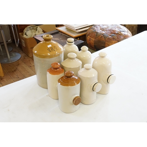 628 - A Collection of Six Bed Warmers with Screw Plugs & Two Flasks.