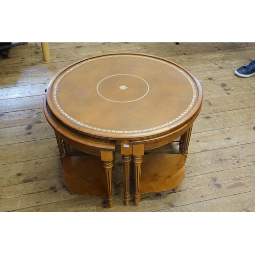 471 - A Set of Quarteto Tables in Yew Wood with Glass Tops to all Tables.