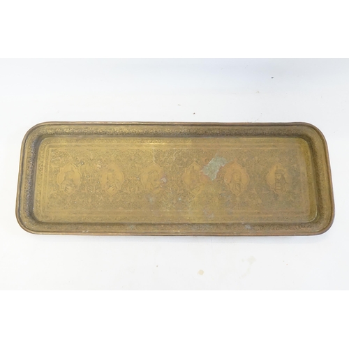 361 - An Indian Benares Brass Engraved Cocktail Tray decorated with the rulers of India. Measuring: 58cms ... 