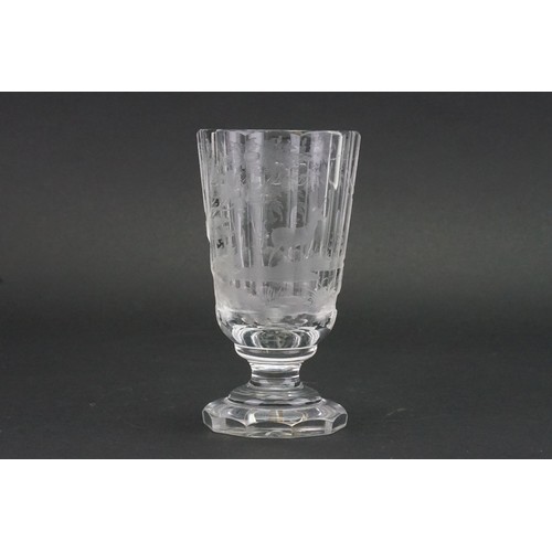 506 - A German Plain Glass engraved Rummer decorated with Deer. Measuring: 14cms high.