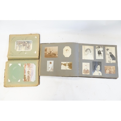 233 - A Family Postcard Album containing a Collection of WWI & Regional Cards along with a Family Photogra... 