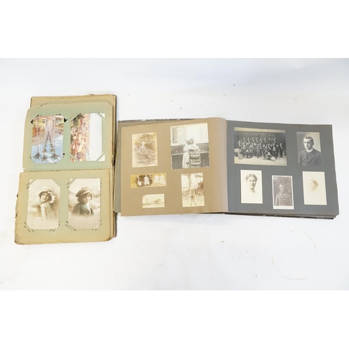 233 - A Family Postcard Album containing a Collection of WWI & Regional Cards along with a Family Photogra... 