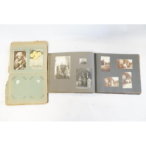 233 - A Family Postcard Album containing a Collection of WWI & Regional Cards along with a Family Photogra... 