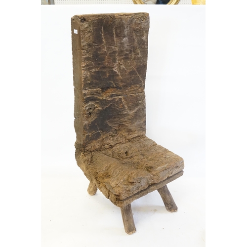 468 - An Irish Naturistically Worn Oak Nursing Chair of Primitive design resting on Tinkers legs? Measurin... 