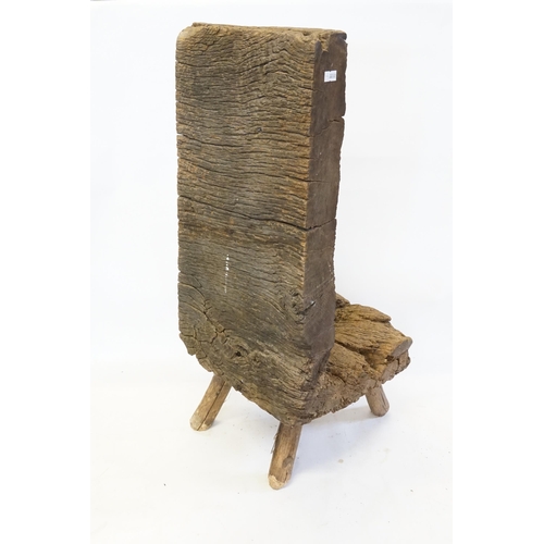 468 - An Irish Naturistically Worn Oak Nursing Chair of Primitive design resting on Tinkers legs? Measurin... 