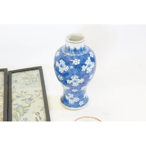 554 - A Chinese enamelled Tea Bowl decorated with Children in Garden scenes, two Blue & White Vases, a Can... 