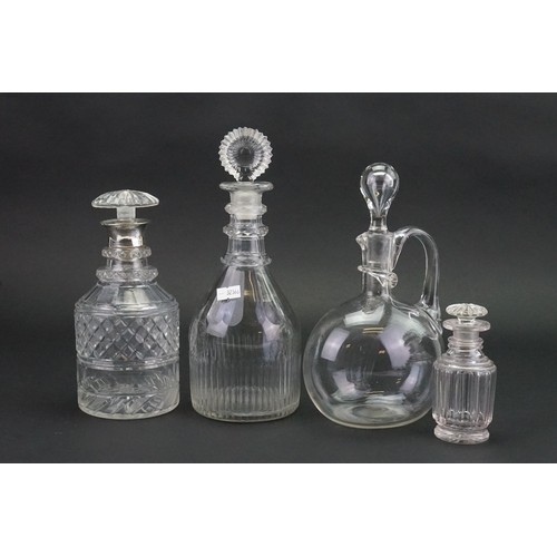 512 - A Three Ring Cut Glass Decanter with Bull's Eye Stopper, a Claret Jug & other Glass.