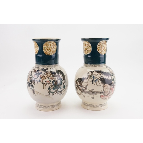 593 - A Pair of Kutani Yakiki Sendan Vases decorated with Sumo Wrestlers & Stylised School Class learning ... 