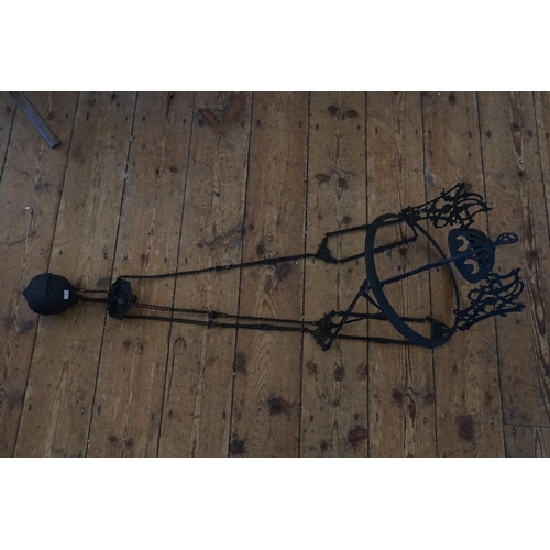 489 - A Cast Metal Black Painted Rise & Fall Lamp.