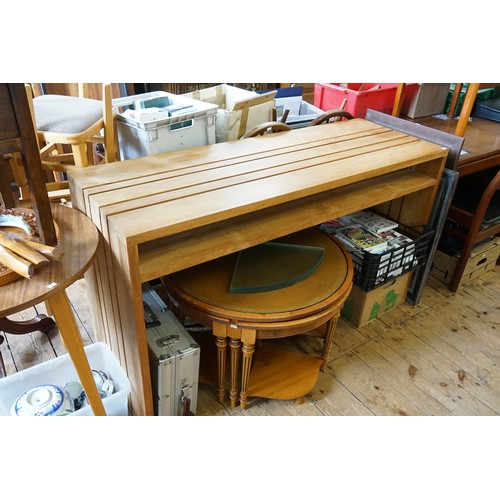 454 - An Indian made design inspired Teak Desk of slated form. Measuring: 140cms across x 50cms deep x 81c... 