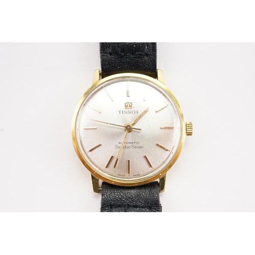 155 - A gold plated Tissot Sea Star Seven automatic watch, silver dial, leather strap and plated buckle. C... 