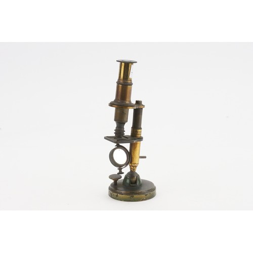 734 - An Early Victorian Brass Cased Monocular Microscope with Rotating Mirror standing on a Ball & a Circ... 