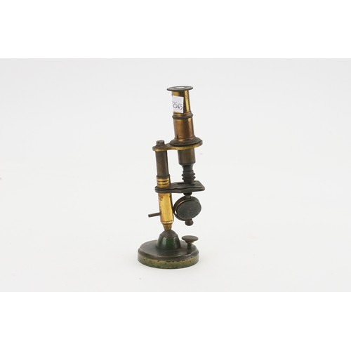 734 - An Early Victorian Brass Cased Monocular Microscope with Rotating Mirror standing on a Ball & a Circ... 