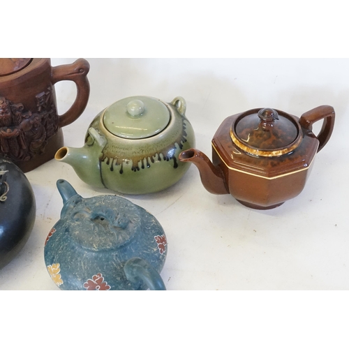 561 - A Collection of Five Various Tea Pots.