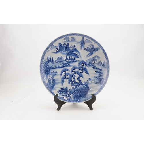 589 - Ex Collection of Rev. John Gage Waller.  A Large Japanese Blue & White Mountainous Landscape Saucer ... 