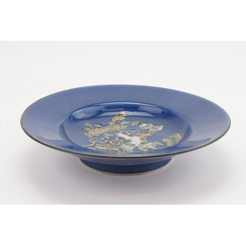 565 - Ex Collection of Rev. John Gage Waller. A Powder Blue Chinese Saucer Dish decorated with a Four Char... 