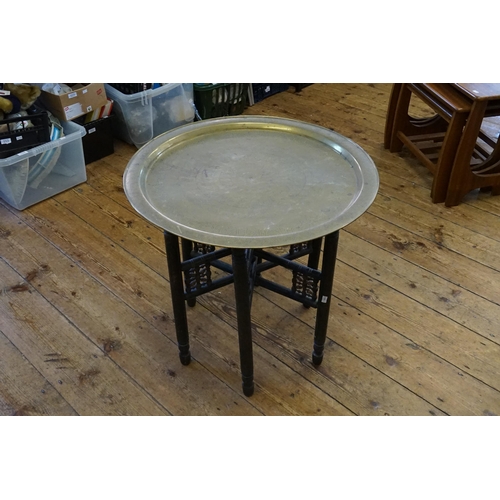 444 - An Indian Tiffin Table on a Folding Stand.