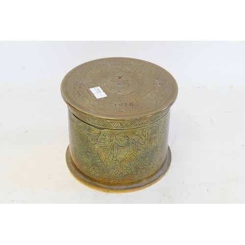 238 - An Egyptian engraved Box & Cover made from a 4.5 Howitzer Shell.