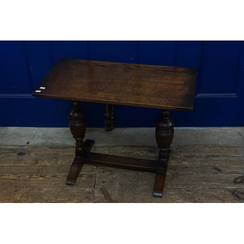 446 - An Oak Refectory Coffee Table.