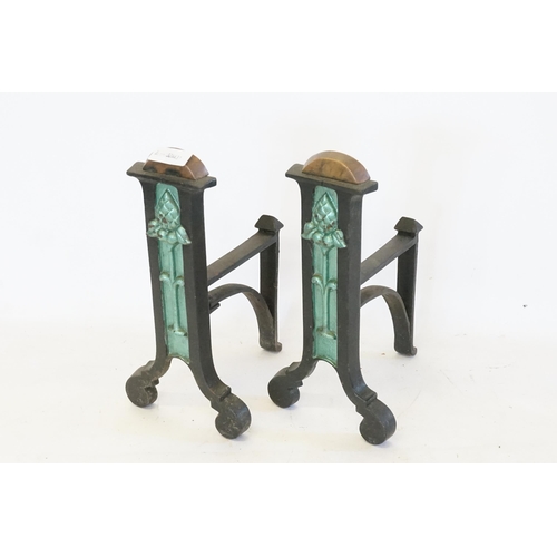 335 - A Pair of Wrought Iron Aesthetic period Fire Dogs.