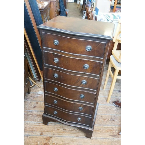 420 - A Cuban Mahogany Veneered Tall Boy Chest of graduated Drawers resting on Bracket Feet. Measuring: 50... 