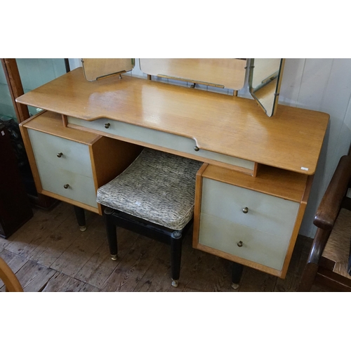 423 - A G-Plan Dressing Table with Recess, Four Drawers & a Dressing Table Stool. Measuring: 125cms across... 