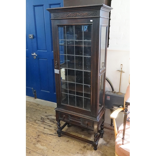 425 - A Single Door Narrow China Display Cabinet with a Leaded Glass Door, Single Drawer & standing on Bar... 