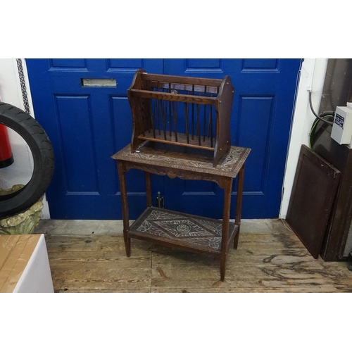 427 - An Oak Chipped Top Carved Table along with a Magazine Rack.