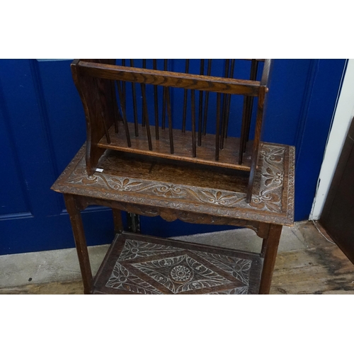 427 - An Oak Chipped Top Carved Table along with a Magazine Rack.