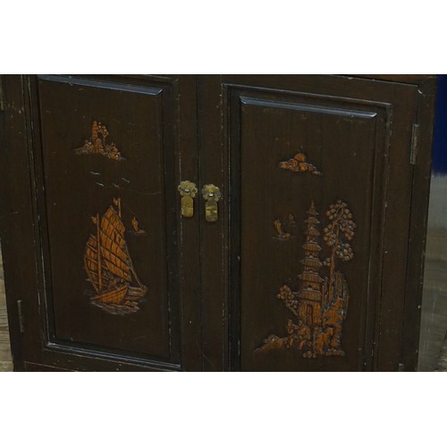 430 - A Chinese Double Door Carved Fronted Cabinet with Brass Drop Handles & resting on Bracket Feet. Meas... 