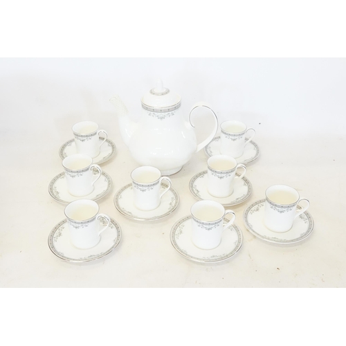 683 - A Royal Doulton Coffee Set in the 