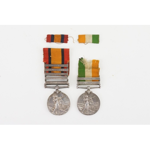 243 - Two WWI South African medals, awarded to PTE H. Willmott Surrey Reg. The medals are set with 7 pins ... 