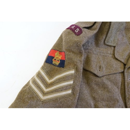 245 - A British WWII 2nd SAS Parachute Reg officers jacket and badges. Kings Crown War officer unit insign... 