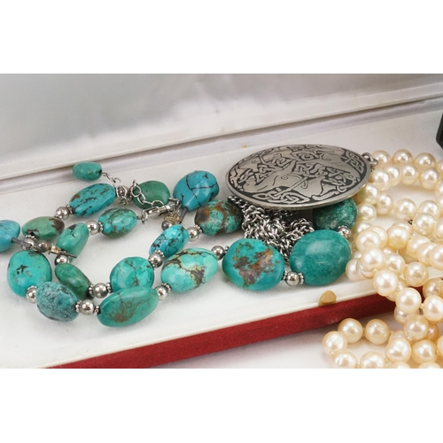 136 - A collection of costume jewellery, to include pearls, turquoise necklace, silver items etc.