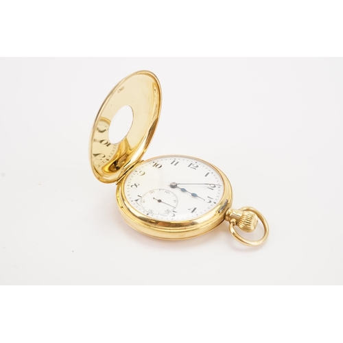 139 - A 18ct gold Dennison cased half hunter pocket watch, with railroad dial and sub second dial. Revue m... 