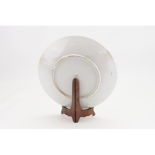 568 - A Rust Coloured Plate. Measuring: 30cms.