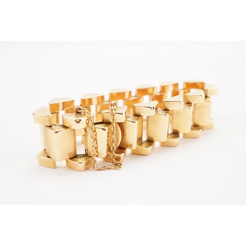 113 - Ex Collection of Mariam Jans Daughter. A heavy high carat gold tank track bracelet, circa 1950's. We... 