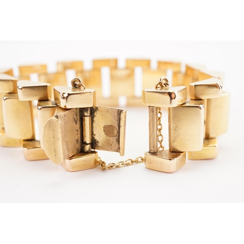 113 - Ex Collection of Mariam Jans Daughter. A heavy high carat gold tank track bracelet, circa 1950's. We... 