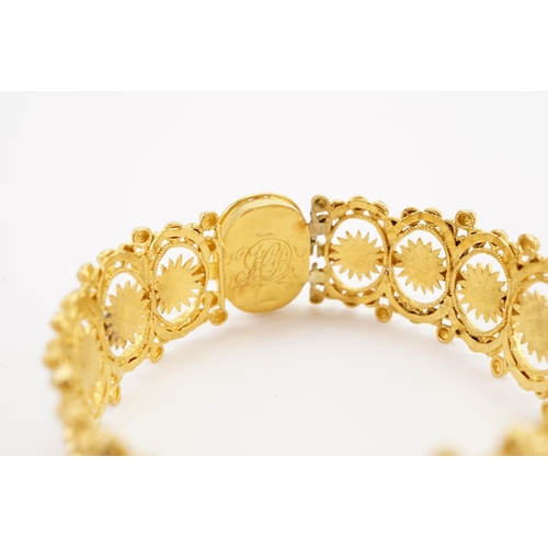 104 - Ex Collection of Mariam Jan (Merjan). A high carat gold Iranian arm band, pinch clasp and single hin... 