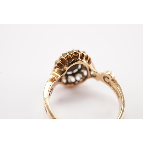 105 - Ex Collection of Mariam Jan (Merjan). A mid carat gold turquoise and diamond halo cluster ring, set ... 